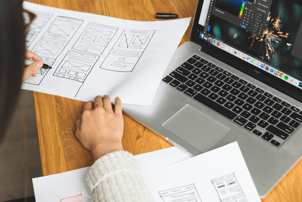 female-designer-reviewing-wireframes